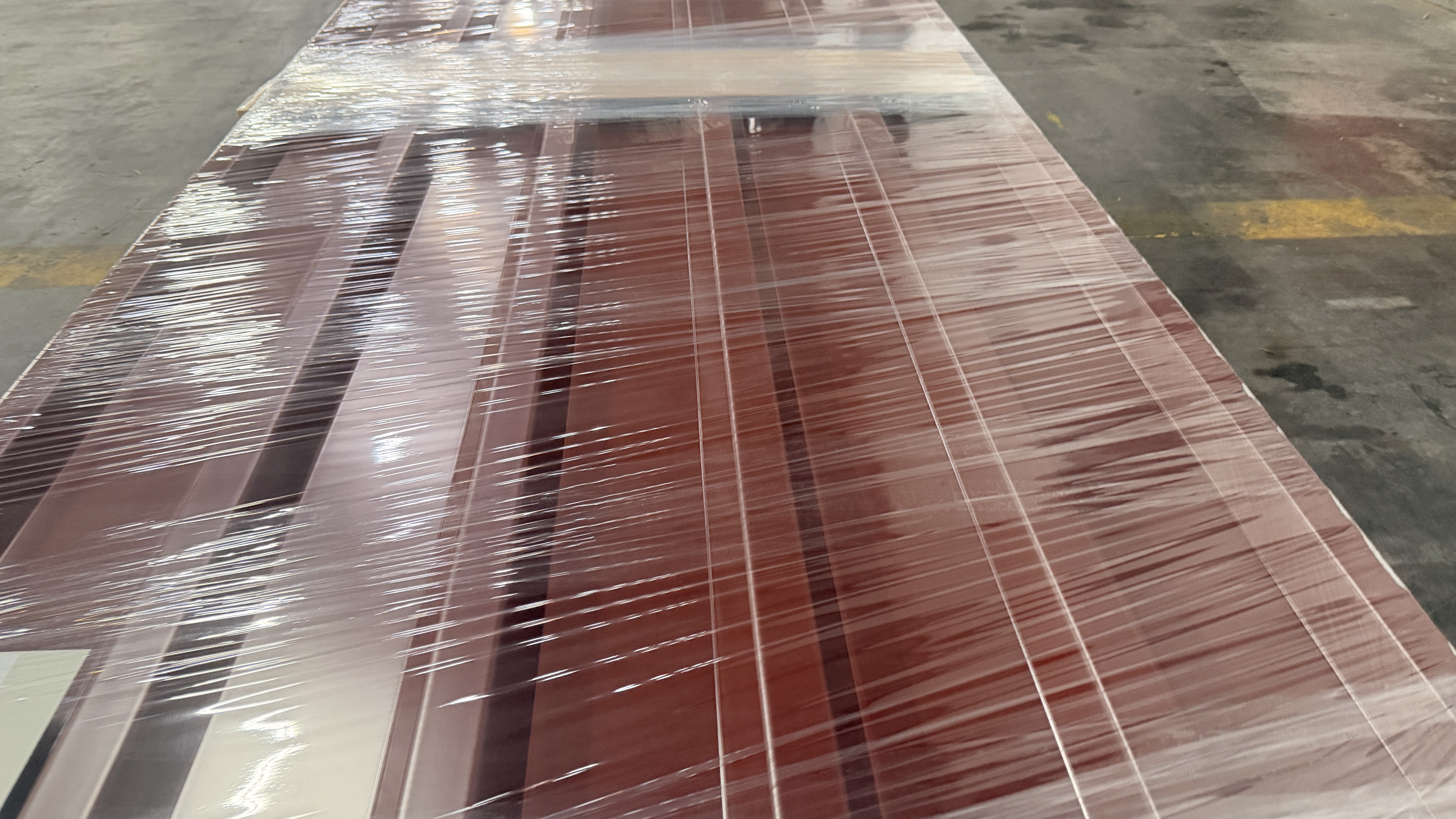 Stahltrapezprofil, Typ: 35/207 - Dach, s = 0,75 mm, Premium-Vlies mit Trennschnitt, 25 my 8012 - 37,26 m²